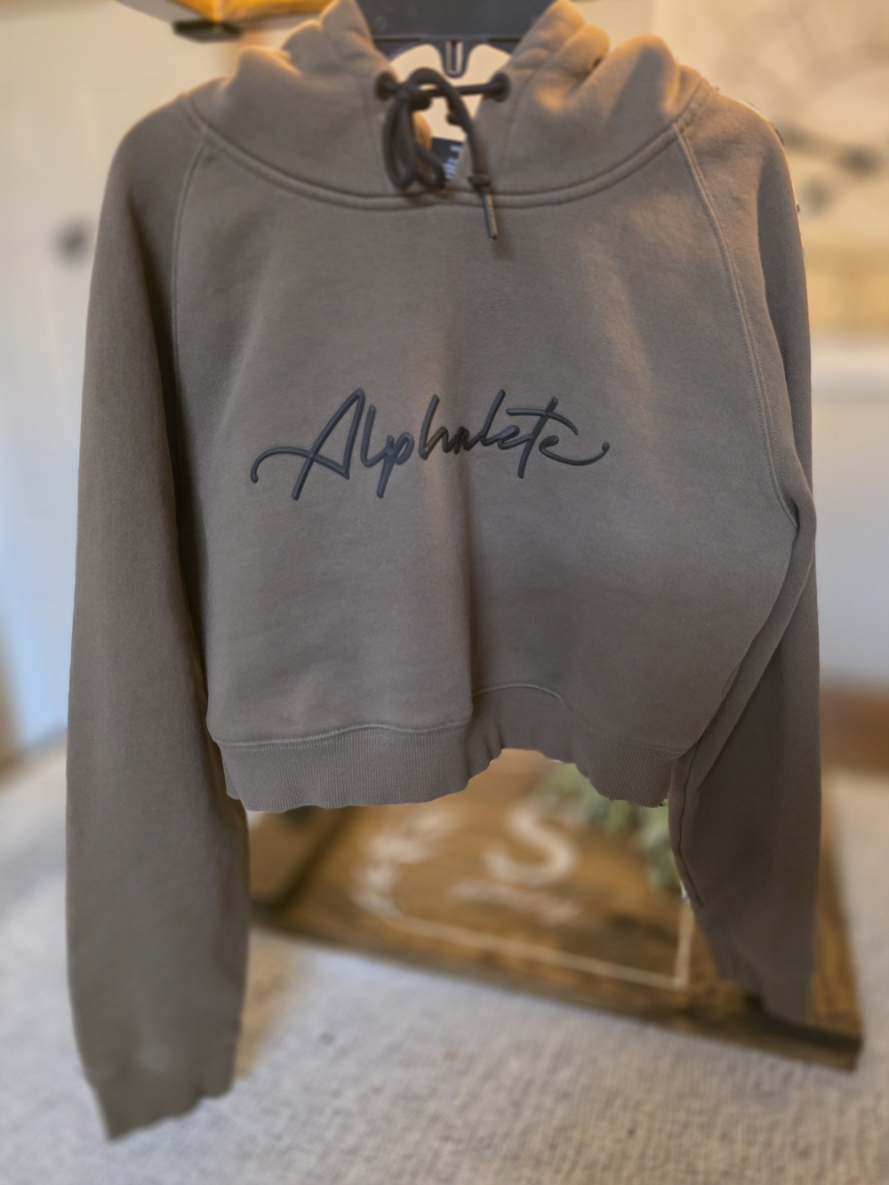 Alphalete Cropped Hoodie in Olive Green with Script Logo